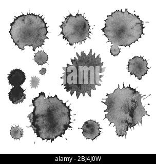 Éclabousse les éclaboussures et les breloques d'encre noire. Fond noir aquarelle. Arrière-plan ou textures aquarelle Banque D'Images