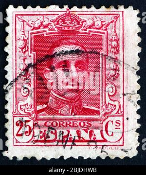 ESPAGNE - VERS 1922 : un timbre imprimé en Espagne montre Alfonso XIII, roi d'Espagne, vers 1922 Banque D'Images