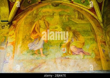 Fresque sur les murs du cloître de la basilique Santa Maria Novella de Florence Italie Banque D'Images