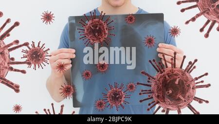 Illustration numérique d'un homme qui tient une radiographie de sa poitrine sur une cellule macro Coronavirus Covid-19 Banque D'Images