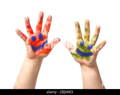 Les mains de l'enfant dans la peinture sur fond blanc Banque D'Images