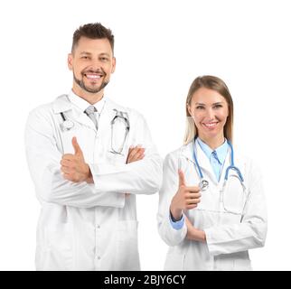 Les médecins hommes et femmes showing thumb-up on white background Banque D'Images