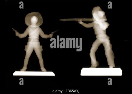Figurines de cowboy en plastique, rayons X. Banque D'Images
