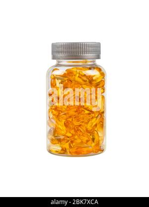 Fermez une bouteille de vitamines oméga 3 jaunes et de pilules pour bouchons de gel d'huiles essentielles de poisson isolées sur fond blanc, vue latérale à faible angle Banque D'Images