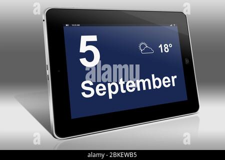 Un ordinateur tablette affiche un calendrier en langue allemande avec la date du 5 septembre | Ein Tablet-Computer zeigt das Datum 5. Septembre Banque D'Images