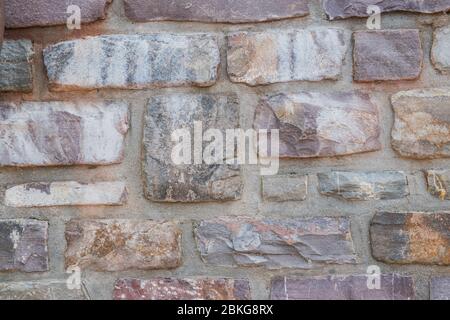 Mur structurel de l'ancien bâtiment du siècle dernier à partir d'une pierre. Banque D'Images