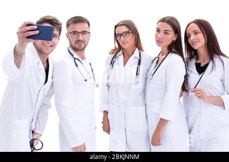 groupe de jeunes médecins réussis prenant des selfies Banque D'Images