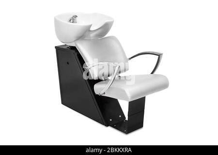 Chaises de laver les cheveux isolés en fond blanc Banque D'Images