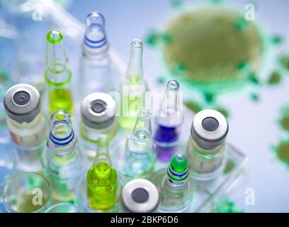 Recherche pharmaceutique sur les maladies et les pandémies. Une variété de médicaments testés en laboratoire avec un modèle 3D de la maladie virale. Banque D'Images