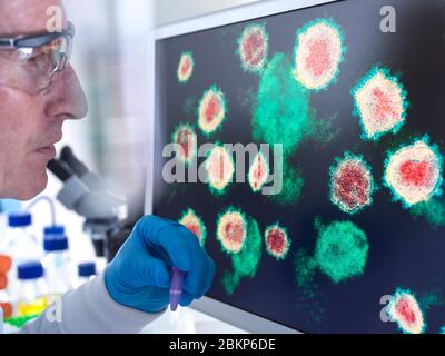 Recherche pharmaceutique sur les maladies et les pandémies. Un scientifique regarde une image du virus à l'aide d'un microscope électronique en laboratoire. Banque D'Images