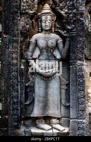 Bas-reliefs au temple Banteay Kdei, complexe du temple d'Angkor Wat, Siem Reap, Cambodge. Banque D'Images