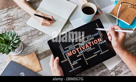 Nuage de mots de motivation sur l'écran de l'appareil Banque D'Images