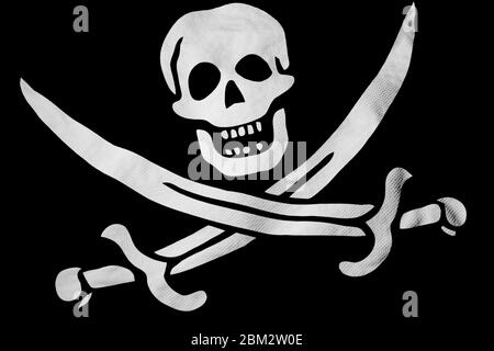 Gros plan plein format sur un drapeau Jolly Roger en rendu 3D. Banque D'Images