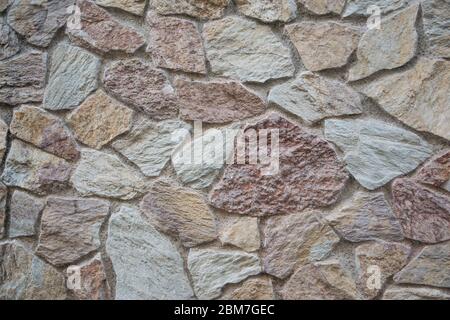 Mur en pierre de l'ancien bâtiment. Banque D'Images