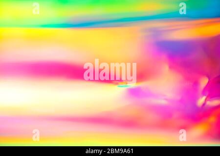 Abstrait l'art numérique fluide d'un flou doux brillant festif heureux fond avec rétro spectre néon dégradé couleurs de bonbons Banque D'Images