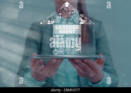 Agent sous licence de texte d'écriture manuscrite. Photo conceptuelle vendeur autorisé et accrédité de polices d'assurance Banque D'Images