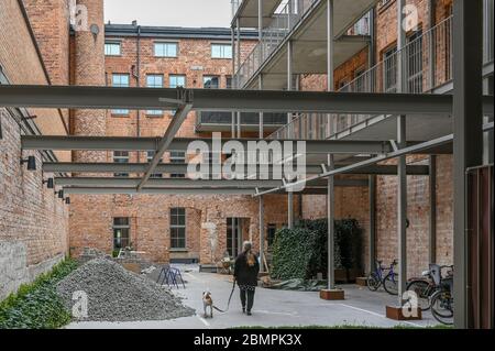 Yllefabriken (usine de Woolf) est une usine textile du paysage industriel de Norrkoping, en Suède, qui est redéveloppée en un bâtiment résidentiel Banque D'Images