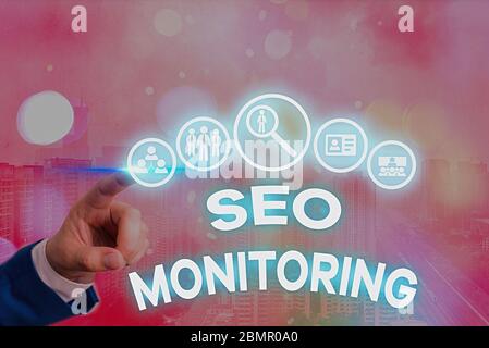 Écriture manuelle conceptuelle montrant Seo Monitoring. Concept signification suivi de l'avancement de la stratégie dans la plate-forme Banque D'Images