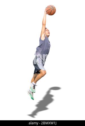 Basket-ball isolés dans la main man jumping on a white background with clipping path... Banque D'Images