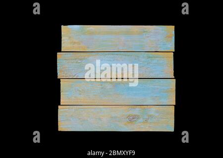 Panneau rustique de couleur pastel isolé sur noir Banque D'Images