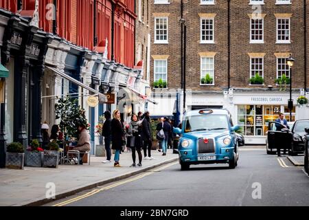 Chiltern Street dans le quartier de Marylebone de Londres ouest- une prime rue commerçante avec des boutiques de mode de luxe et de lieux de vie nocturne Banque D'Images