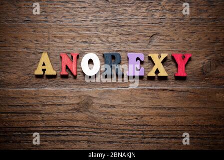 Mot Anorexy sur une table en bois. Banque D'Images