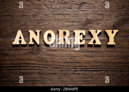 Mot Anorexy sur une table en bois. Banque D'Images