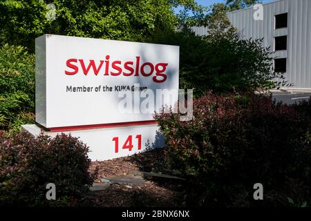 Un logo à l'extérieur d'une installation occupée par Swisslog à Newport News, en Virginie, le 2 mai 2020. Banque D'Images