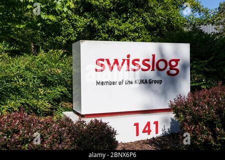 Un logo à l'extérieur d'une installation occupée par Swisslog à Newport News, en Virginie, le 2 mai 2020. Banque D'Images