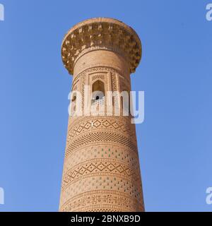 Sayid Niaz Sheliker Minaret, près de la porte est de Khiva, en Ouzbékistan. Banque D'Images