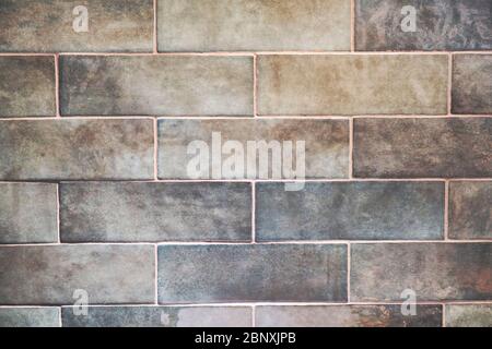 Un vieux mur de briques montrant un arrière-plan de texture de détail de gros plan Banque D'Images