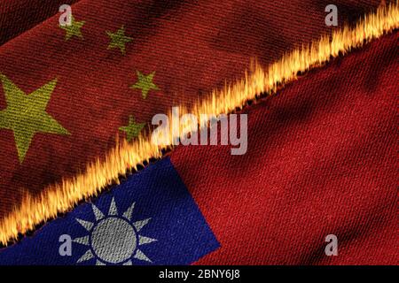 Représentation en 3D des drapeaux de la Chine et de Taïwan sur le feu illustrant le concept de tension politique et de conflit entre les deux entités. Banque D'Images