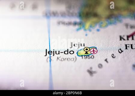 Faible profondeur de champ accent sur la carte géographique de l'île de Jeju en Corée du Sud continent asiatique sur atlas Banque D'Images