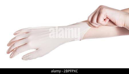 Au-dessus de la main de femme porte des gants en latex sur une autre main isolé sur fond blanc Banque D'Images