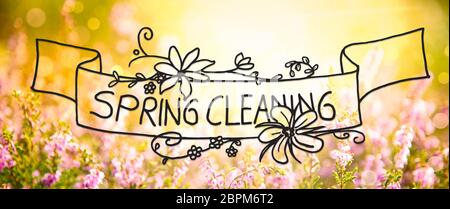 Calligraphie anglaise Nettoyage de printemps. Erica Champ de fleur ou de prairies. Printemps ensoleillé ou saison d'été. Banque D'Images