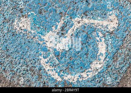 Symbole d'invalidité détériorée peint sur le sol. Idéal pour les concepts et les milieux. Banque D'Images