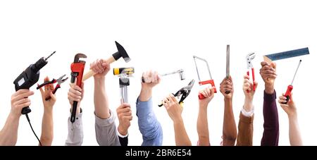 Close-up of People's Hand Holding Outils Menuiserie Against White Background Banque D'Images