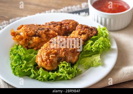 Pilons de poulet frit de babeurre Close-up Banque D'Images