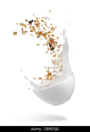 bol de muesli avec éclaboussures de lait isolées sur blanc Banque D'Images