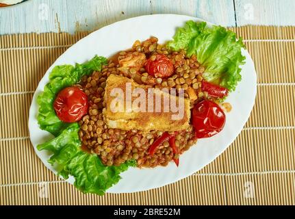 Harissa émietté de poisson avec des lentilles, préparer le repas de mi-semaine Banque D'Images