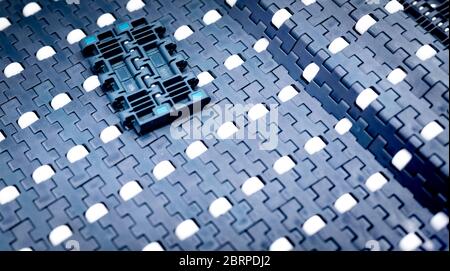 La texture de la courroie du convoyeur modulaire avec rouleau. L'équipement de transport. Pièces pour la machine dans l'usine. Utilisez pour déplacer les produits dans l'industriel. Convoyeur à courroies Banque D'Images