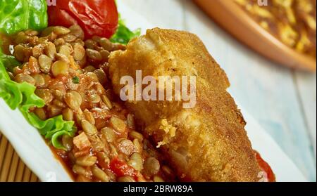 Harissa émietté de poisson avec des lentilles, préparer le repas de mi-semaine Banque D'Images