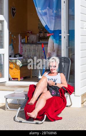 Poole, Dorset, Royaume-Uni. 23 mai 2020. Météo au Royaume-Uni : vent et sorts ensoleillés sur les plages de Poole pour le début du long week-end de vacances en banque. Après les plages remplies le week-end dernier, les visiteurs sont invités à rester loin, même si les restrictions concernant les coronavirus ont été assouplies, en particulier sans sauveteurs en service et avec des installations limitées. Crédit : Carolyn Jenkins/Alay Live News Banque D'Images