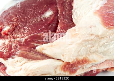 texture de la viande de porc fraîche et brute. Gros plan photo de viande de porc. Fond de viande de porc fraîche. Banque D'Images