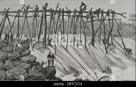 Historia de Afrique. SIGLO XIX Aparatos para la pesca preparados en las Cascadas Stanley. Grabado por W. Meyer. El Congo y la Creación del Estado Independiente de este nombre. Historia de los Trabajos y Exploraciones Verificados, por Enrique M. Stanley. Editada en Barcelona, hacia 1890. Espagne. Banque D'Images