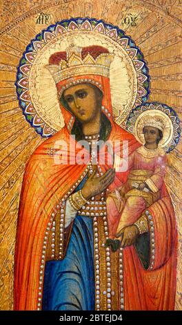 Icône byzantine d'Ukraine appelée 'Consolateur des affligés' représentant Sainte Marie mère de Dieu pointant vers son bébé Jésus Christ avec sa main. Banque D'Images