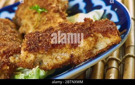 Filets de poisson Tex-Mex, filets de poisson blanc cuits dans un bain de salsa maison. Banque D'Images