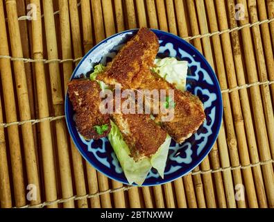 Filets de poisson Tex-Mex, filets de poisson blanc cuits dans un bain de salsa maison. Banque D'Images