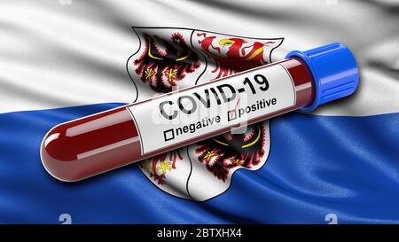 Drapeau italien du Trentin-Tyrol du Sud agitant dans le vent avec un tube de test sanguin Covid-19 positif. Banque D'Images