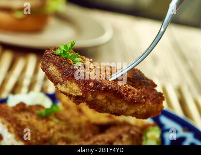 Filets de poisson Tex-Mex, filets de poisson blanc cuits dans un bain de salsa maison. Banque D'Images